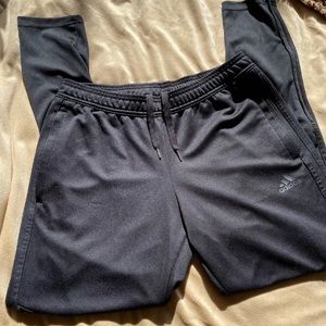 Womens Adidas black joggers w/black stripes, size medium 12-14.  Good condition!